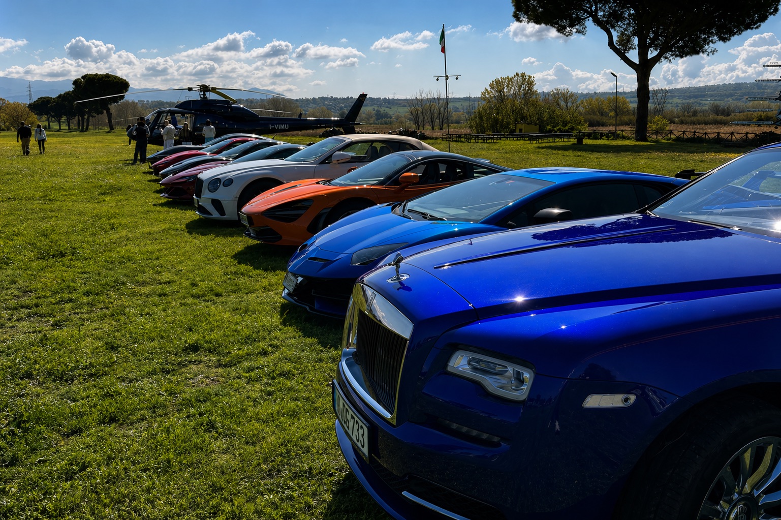 Supercars and helicopter before the route